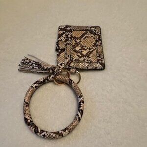 Faux snakeskin wristlet wallet